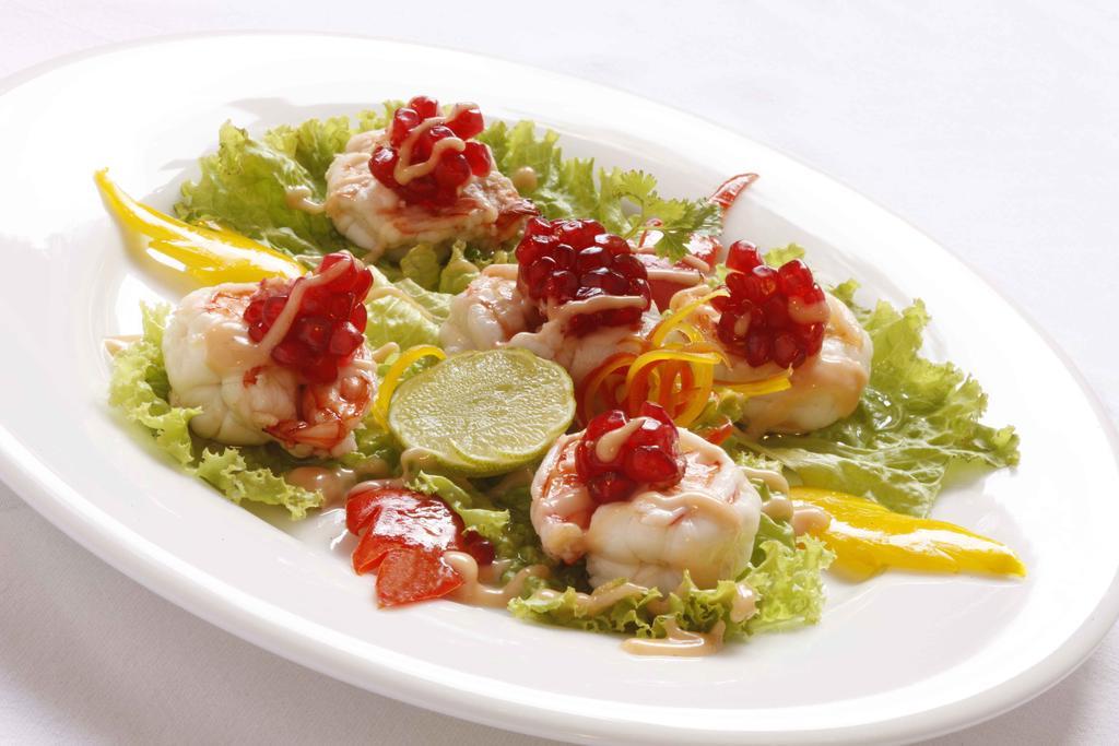 Heritage Madurai Exteriér fotografie A salad of scallops