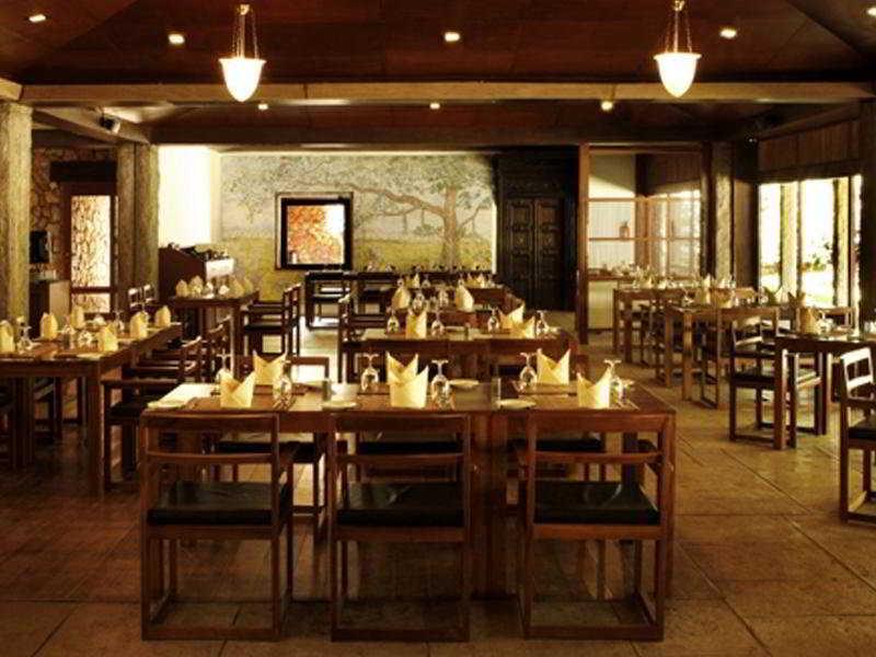 Heritage Madurai Restaurace fotografie The interior of a restaurant